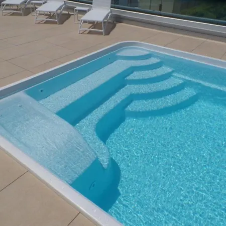 Apartment Modern Poolside Escape